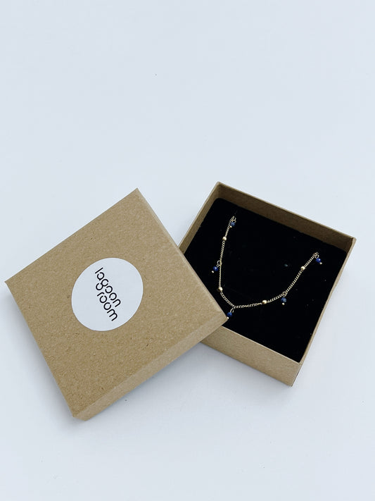 GOLD DARK BLUE CHARMS NECKLACE