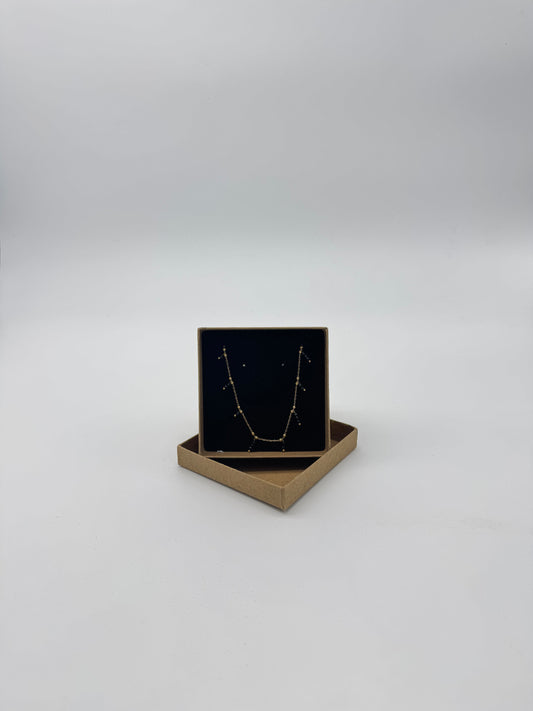 GOLD BLACK CHARMS NECKLACE