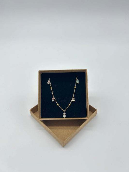 GOLD NECKLACE WITH BLUE PINK CHARMS