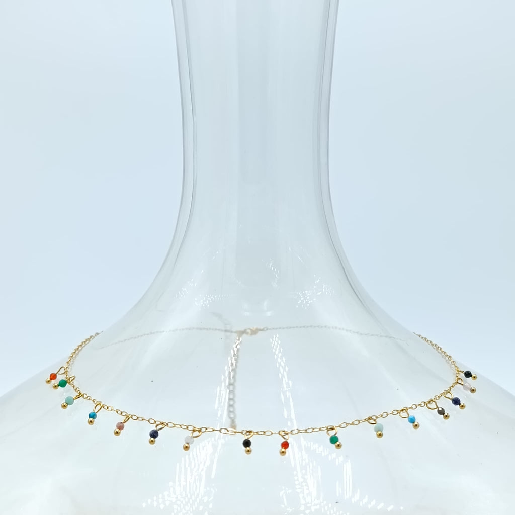 GOLD COLORED TEARS NECKLACE